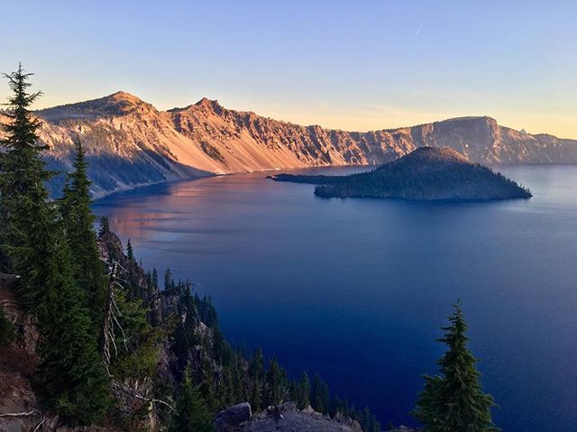 An incredible sunrise over Crater Lake. 💜The lake is surrounded by mountains and was created more than 7,700 years ago after a volcano erupted. #nps #craterlake #findyourpark #Oregon @nationalparkservice #lovegoparks @goparks @columbia1938